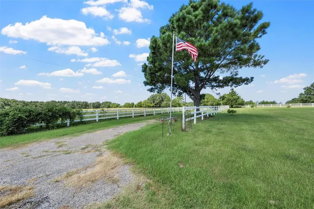 a view of a golf course with a lake