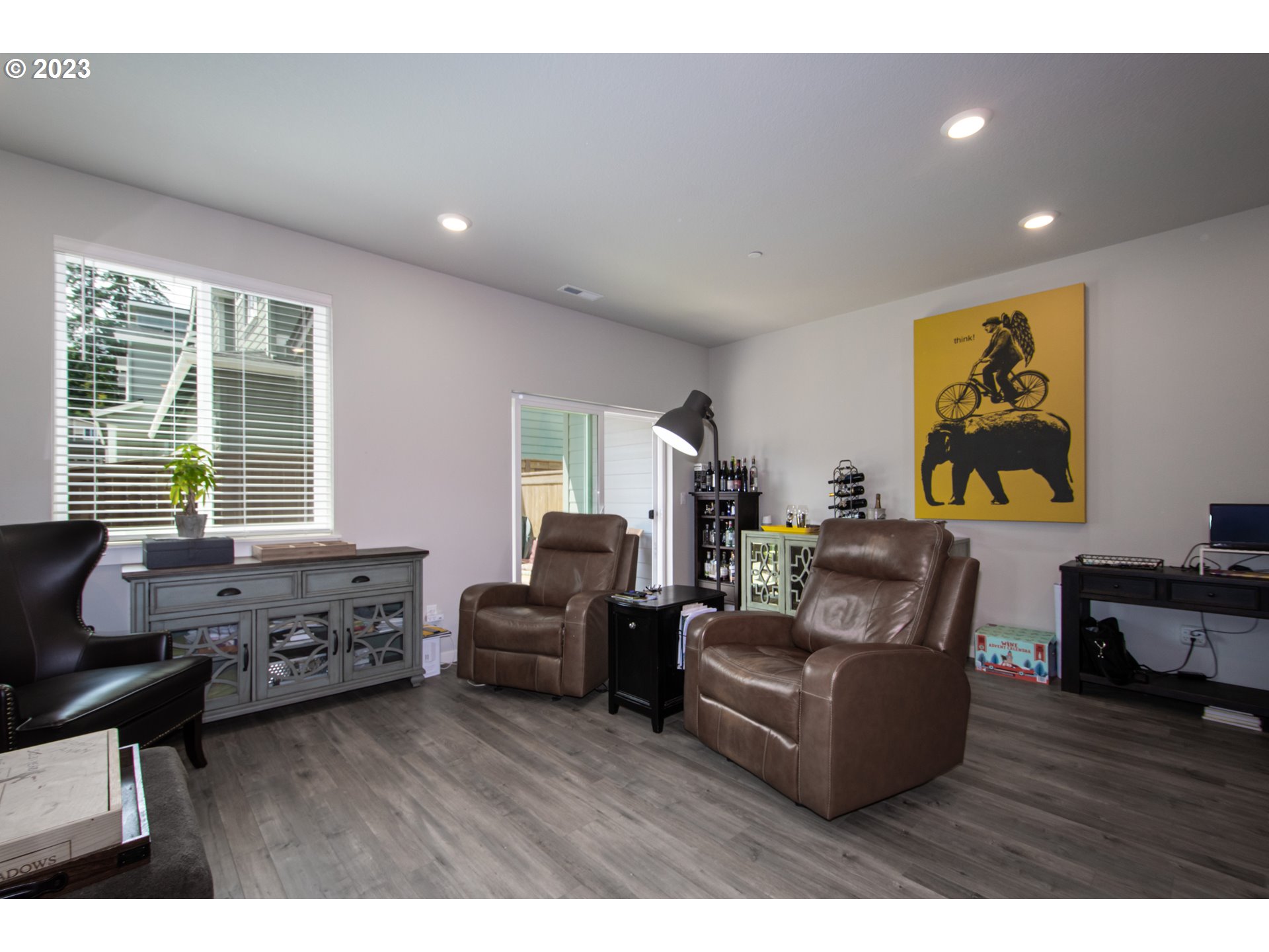 4255 South Waters Edge Way Ridgefield, WA 98642 - Photo 3 of 19 a living room with furniture and wooden floor