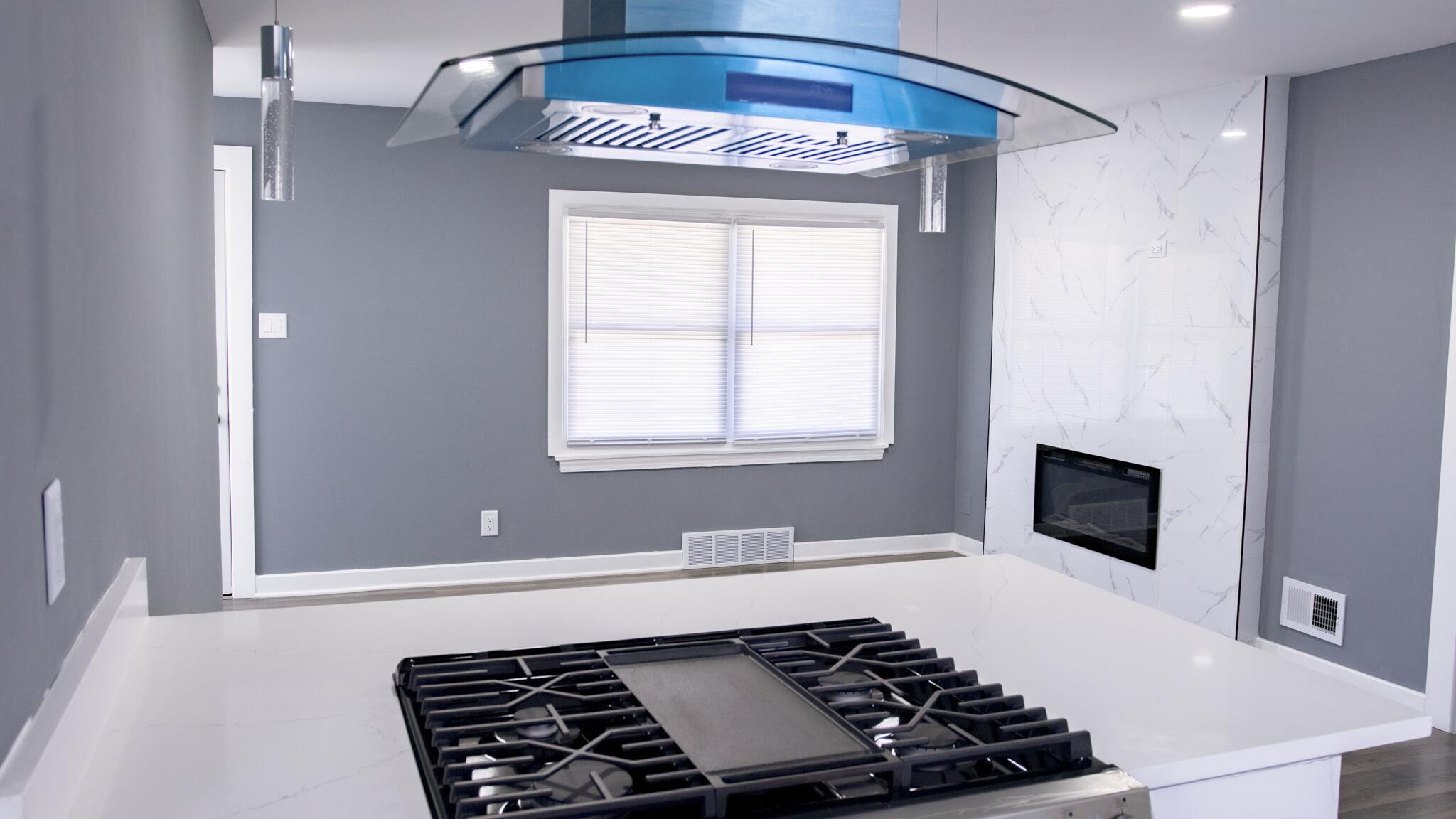 418 Dallas Street Gary, IN 46406 - Photo 19 of 22 a room with a stove and a window