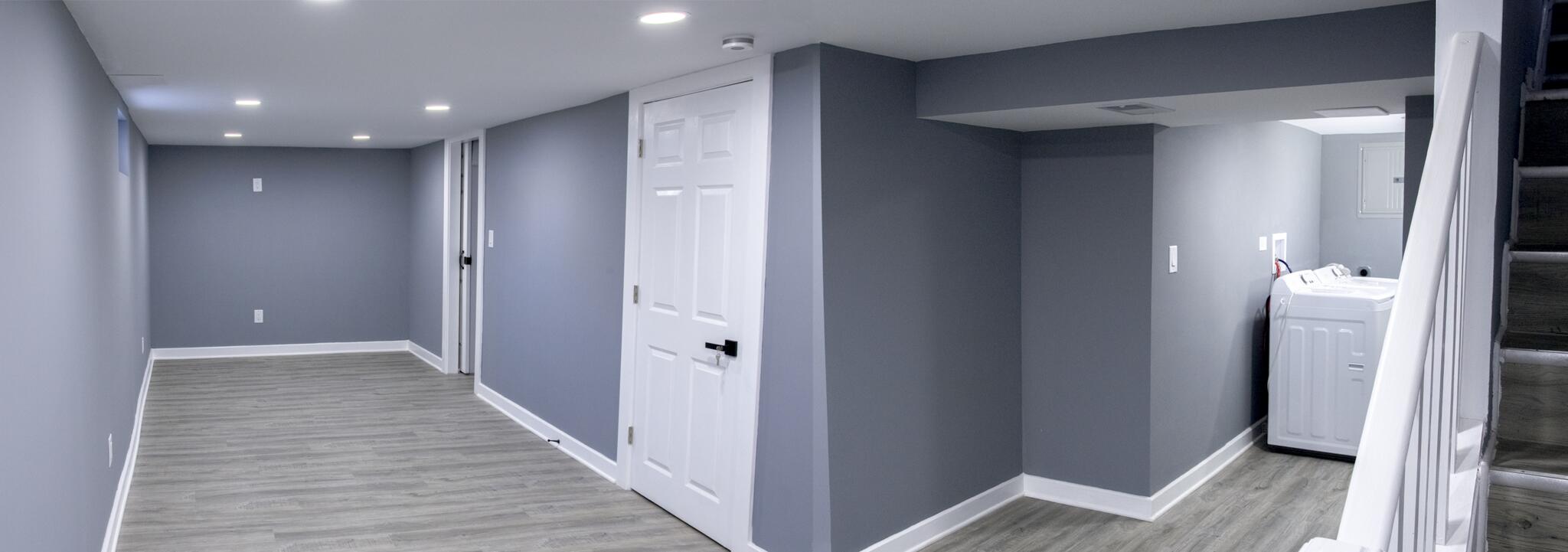 418 Dallas Street Gary, IN 46406 - Photo 2 of 22 a view of a hallway with wooden floor