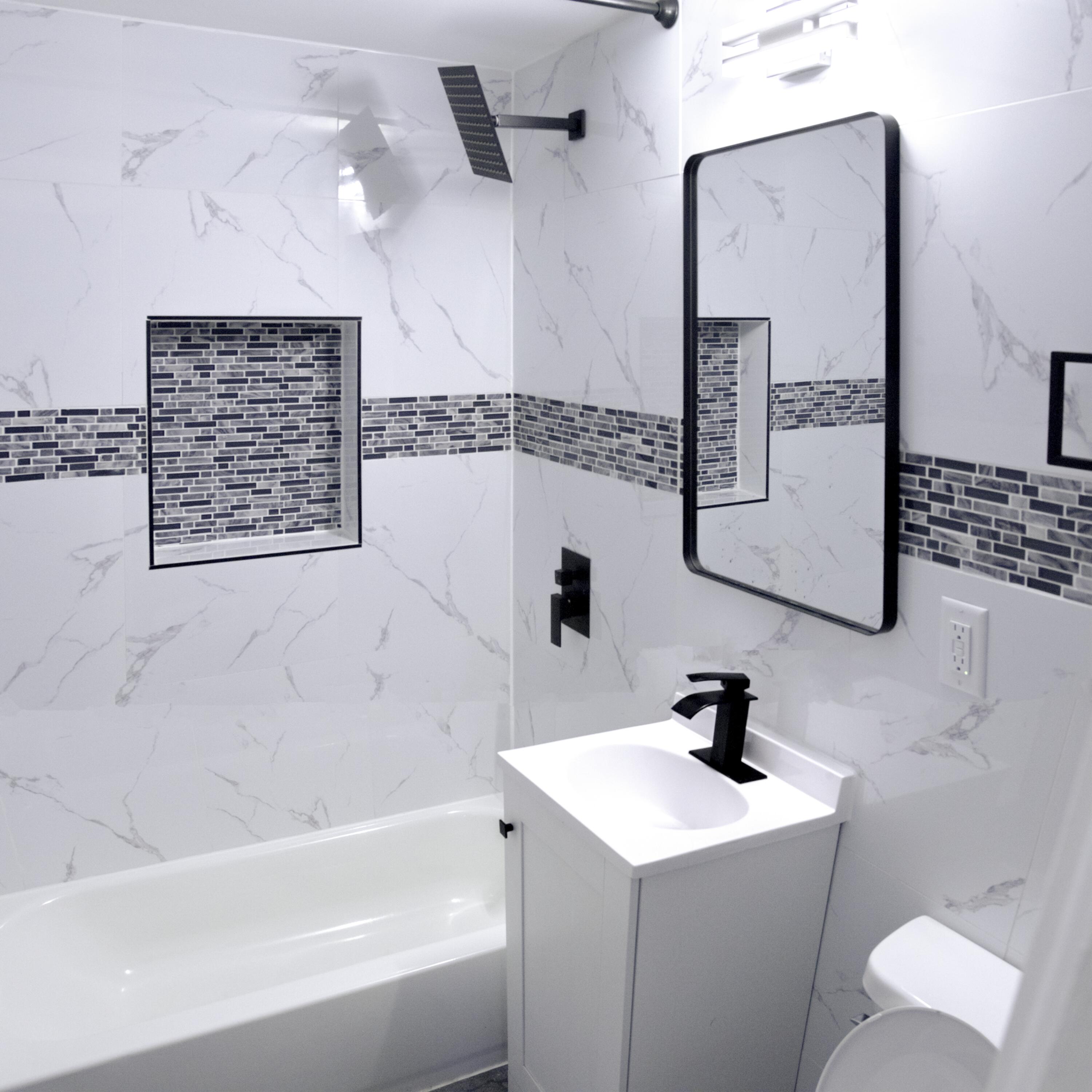 418 Dallas Street Gary, IN 46406 - Photo 21 of 22 a bathroom with a bathtub and a sink