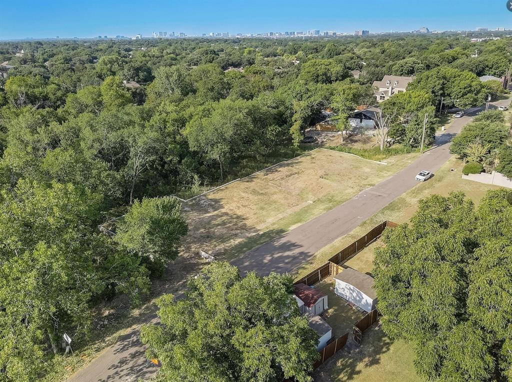 6724 Starbuck Drive Dallas, TX 75252 - Photo 23 of 30 an aerial view of a house with a yard