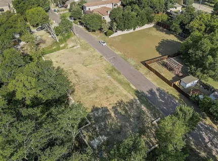 an aerial view of residential house with pool