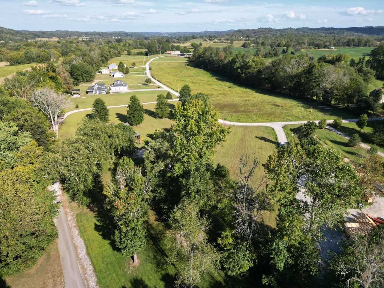 0 Rockhouse Trce Road Albany, KY 42602 - Photo 13 of 24 a view of a lake with a mountain