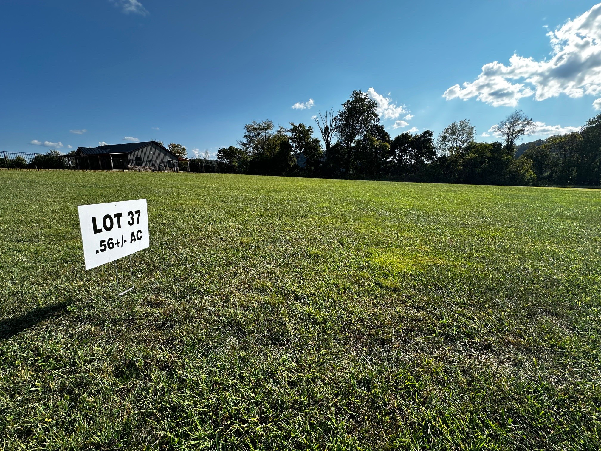 0 Rockhouse Trce Road Albany, KY 42602 - Photo 8 of 24 a view of a sign in a field