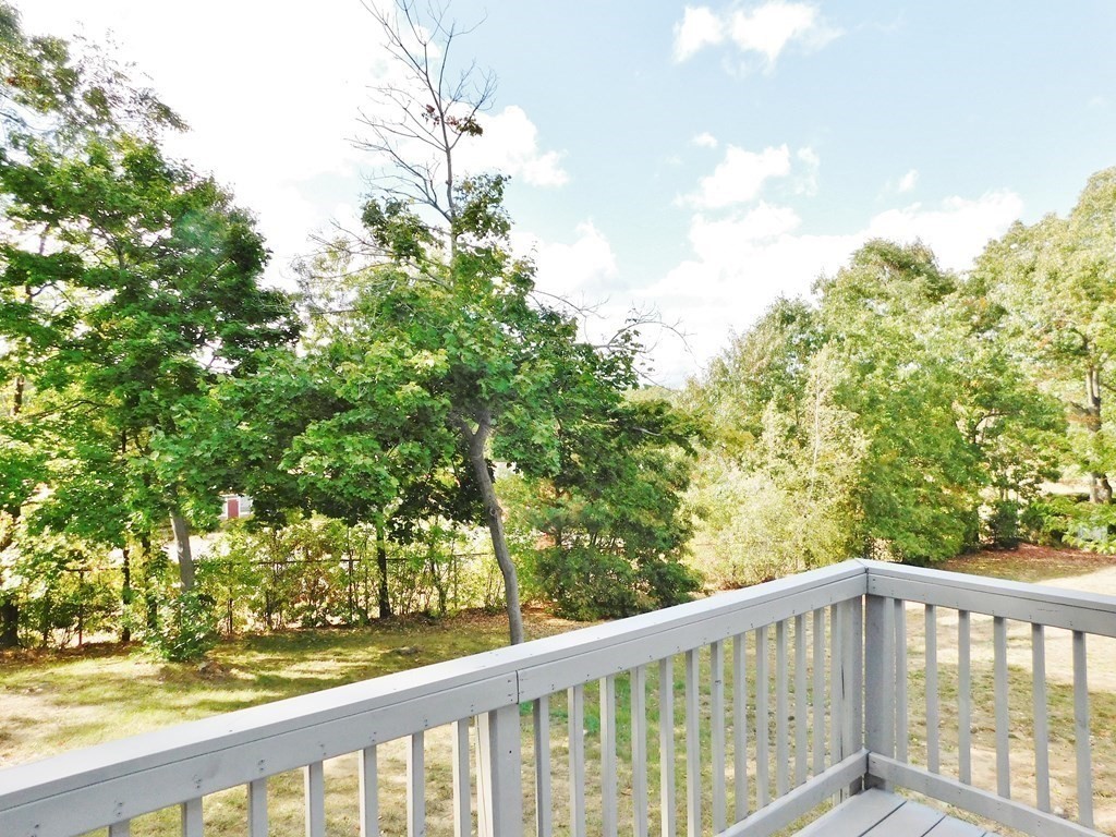 214 Hartwick Street Springfield, MA 01108 - Photo 24 of 25 a view of a balcony with trees