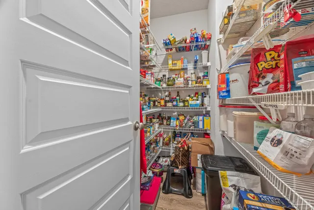 a very nice looking room with a large mirror and sink