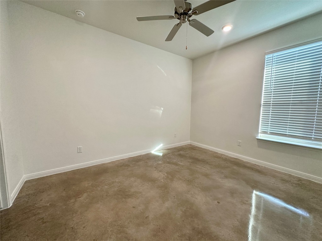 2913 Quail Rdg Lane, Unit A Temple, TX 76501 - Photo 13 of 19 Spare room with concrete floors, recessed lighting, and ceiling fan