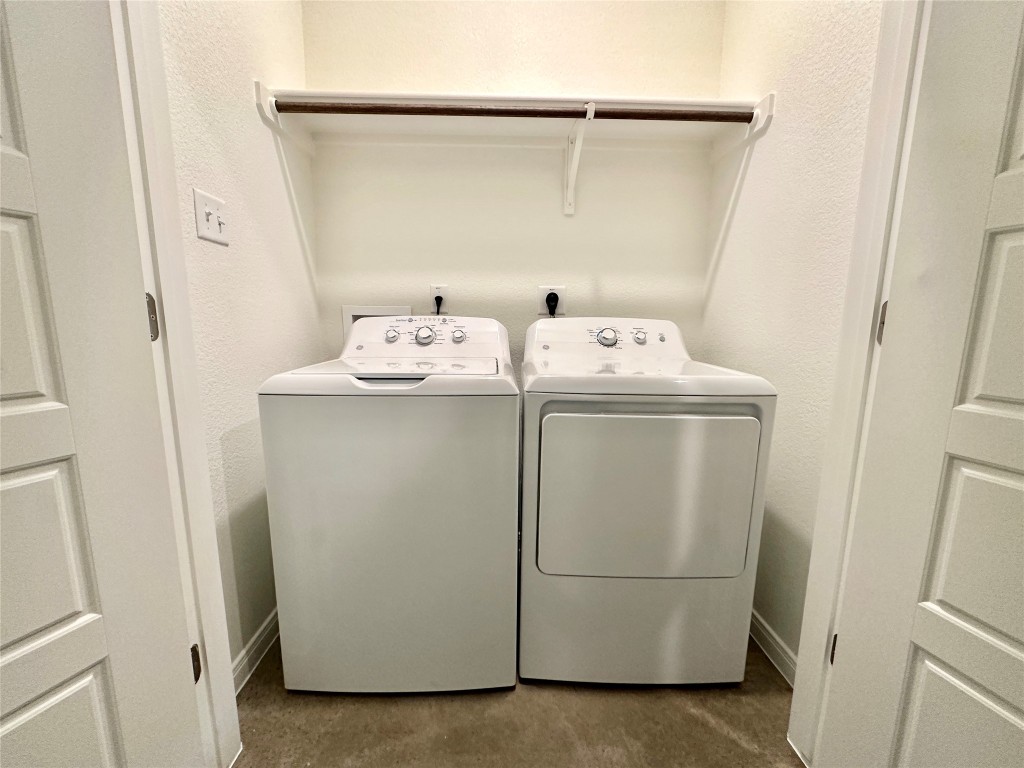 2913 Quail Rdg Lane, Unit A Temple, TX 76501 - Photo 15 of 19 Laundry area with separate washer and dryer and a textured wall