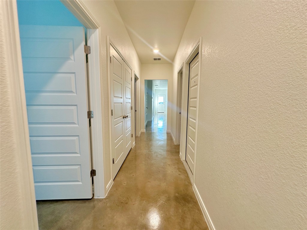 2913 Quail Rdg Lane, Unit A Temple, TX 76501 - Photo 4 of 19 Corridor with concrete flooring and a textured wall