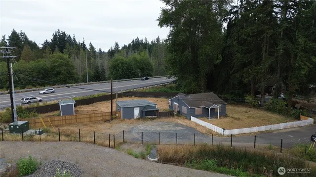 a house view with a backyard space