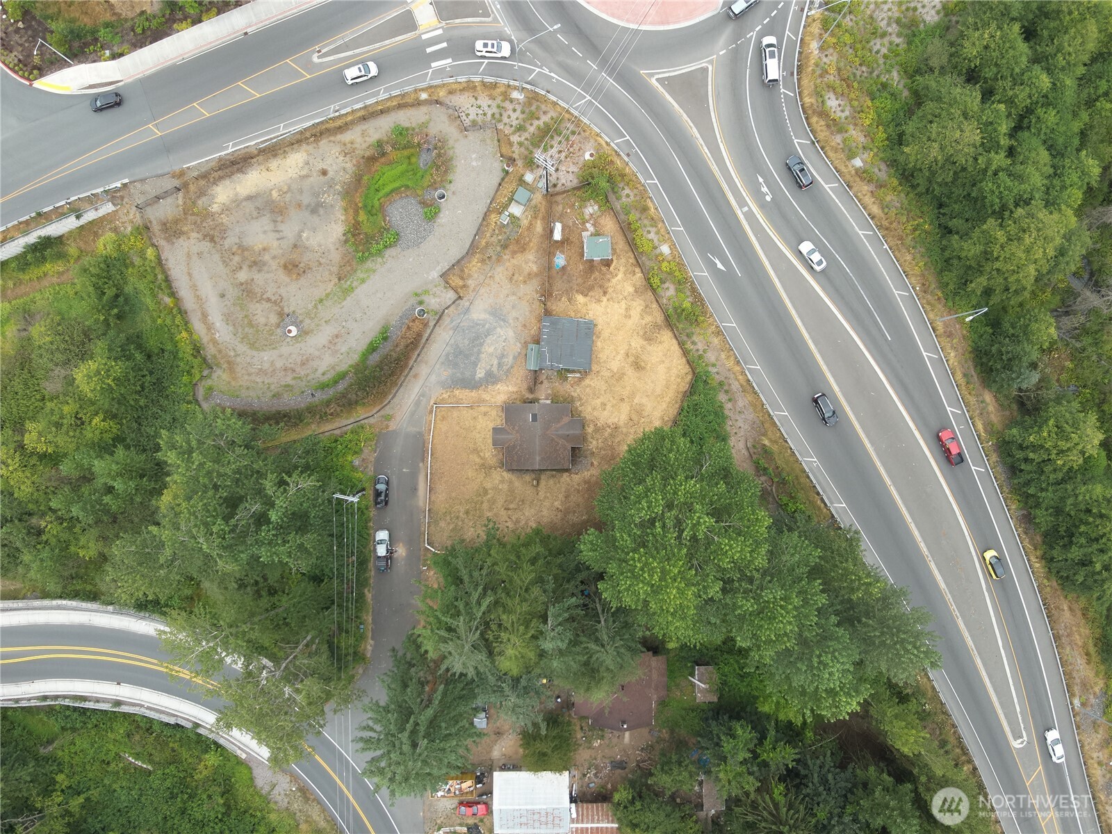 2415 South Lake Stevens Road Lake Stevens, WA 98258 - Photo 6 of 13 a swimming pool with trees in the background