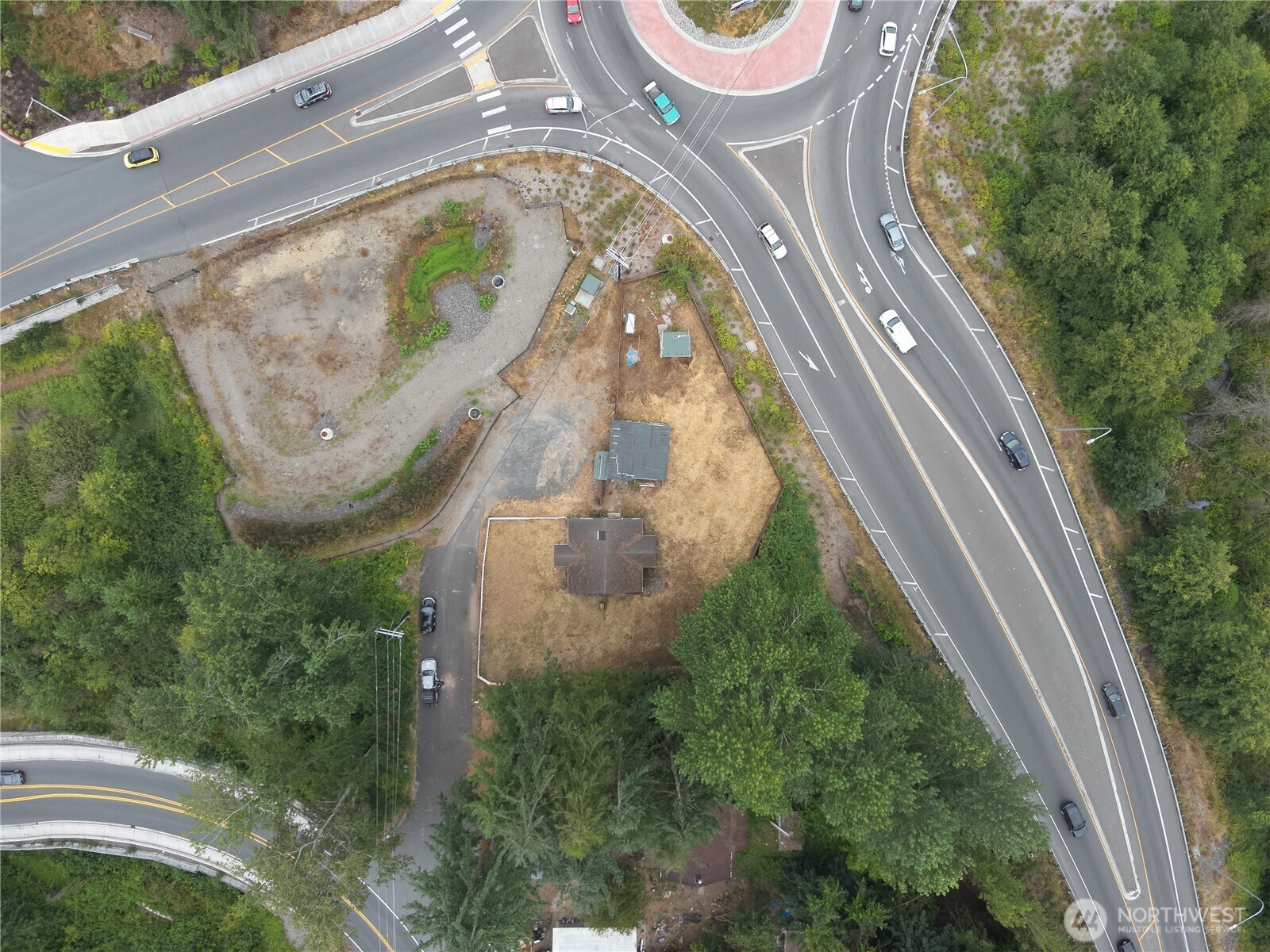 2415 South Lake Stevens Road Lake Stevens, WA 98258 - Photo 7 of 13 a view of a swimming pool with a fountain in the background