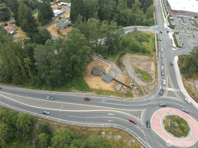 a view of swimming pool with a yard and green space