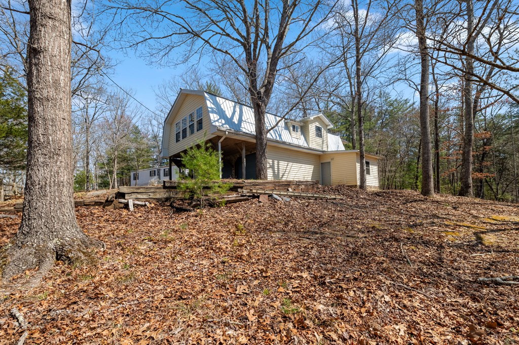 1262 Maple Grove Road Morganton, GA 30560 - Photo 11 of 68 a view of a house with a yard