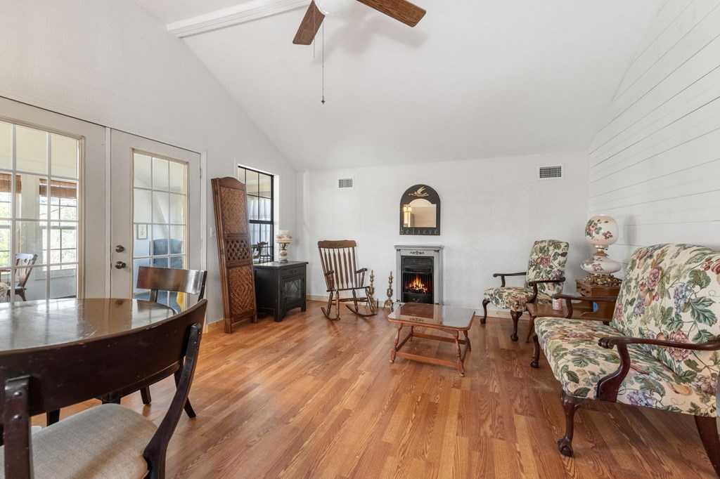 1262 Maple Grove Road Morganton, GA 30560 - Photo 24 of 68 a living room with furniture and a wooden floor