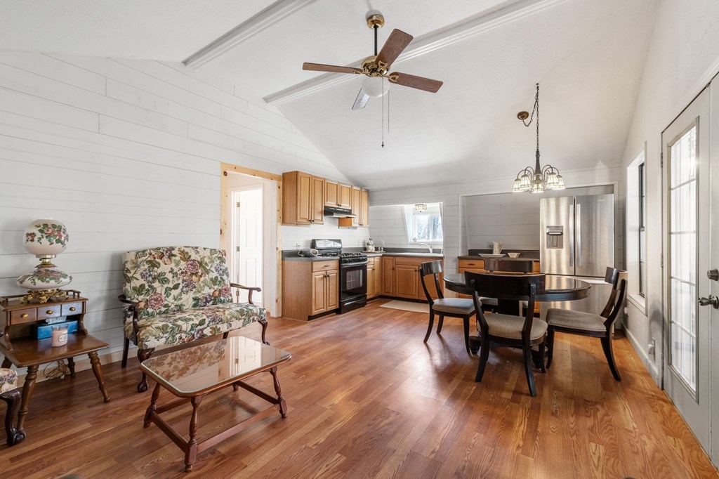 1262 Maple Grove Road Morganton, GA 30560 - Photo 26 of 68 a view of a dining room with furniture and wooden floor