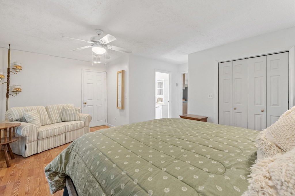 1262 Maple Grove Road Morganton, GA 30560 - Photo 28 of 68 a spacious bedroom with a bed and a couch