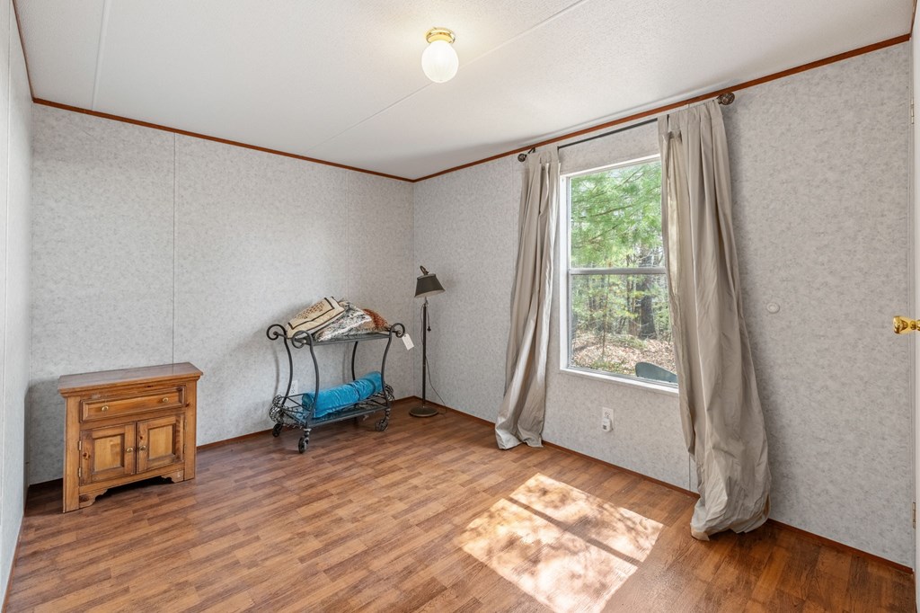 1262 Maple Grove Road Morganton, GA 30560 - Photo 43 of 68 a bedroom with furniture and a window