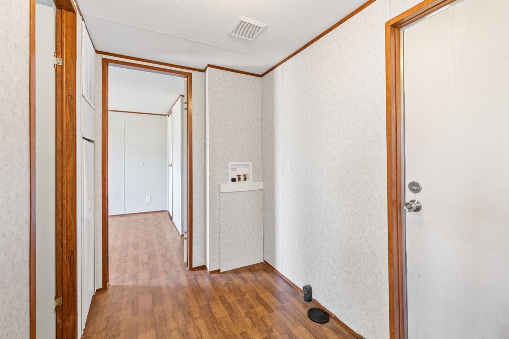 1262 Maple Grove Road Morganton, GA 30560 - Photo 50 of 68 a view of hallway with closet and wooden floor