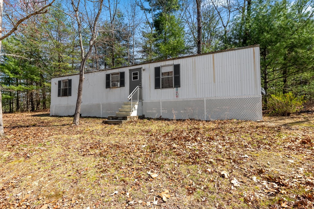 1262 Maple Grove Road Morganton, GA 30560 - Photo 52 of 68 a backyard of a house