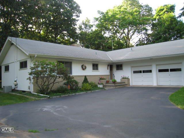 204 Cascade Road Stamford, CT 06903 - Photo 1 of 1 a view of a house with backyard and a garden
