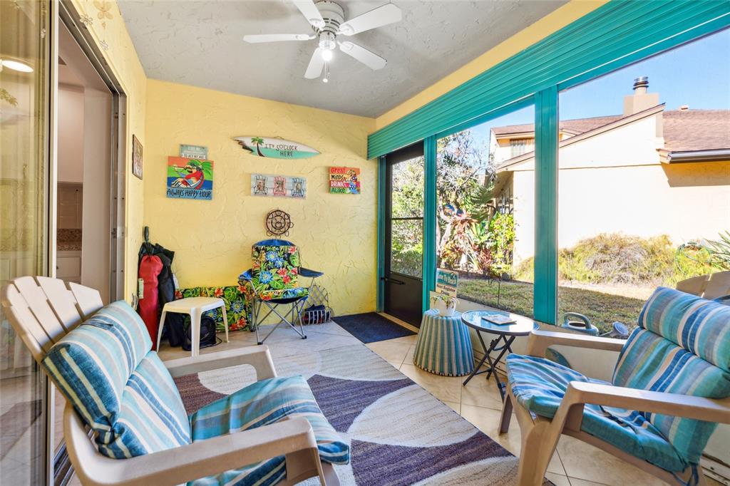 2101 Sunset Point Road, Unit 1102 Clearwater, FL 33765 - Photo 10 of 27 Cozy screened-in patio