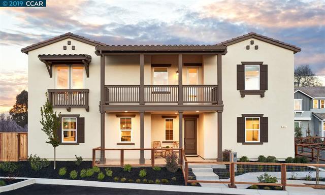 877 Barney Common Livermore, CA 94551 - Photo 1 of 1 a front view of a residential apartment building with a yard