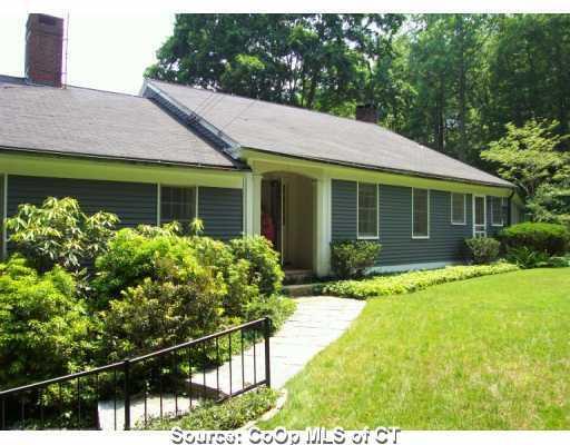 Undisclosed Address Lyme, CT 06371 - Photo 1 of 1 a front view of a house with a yard