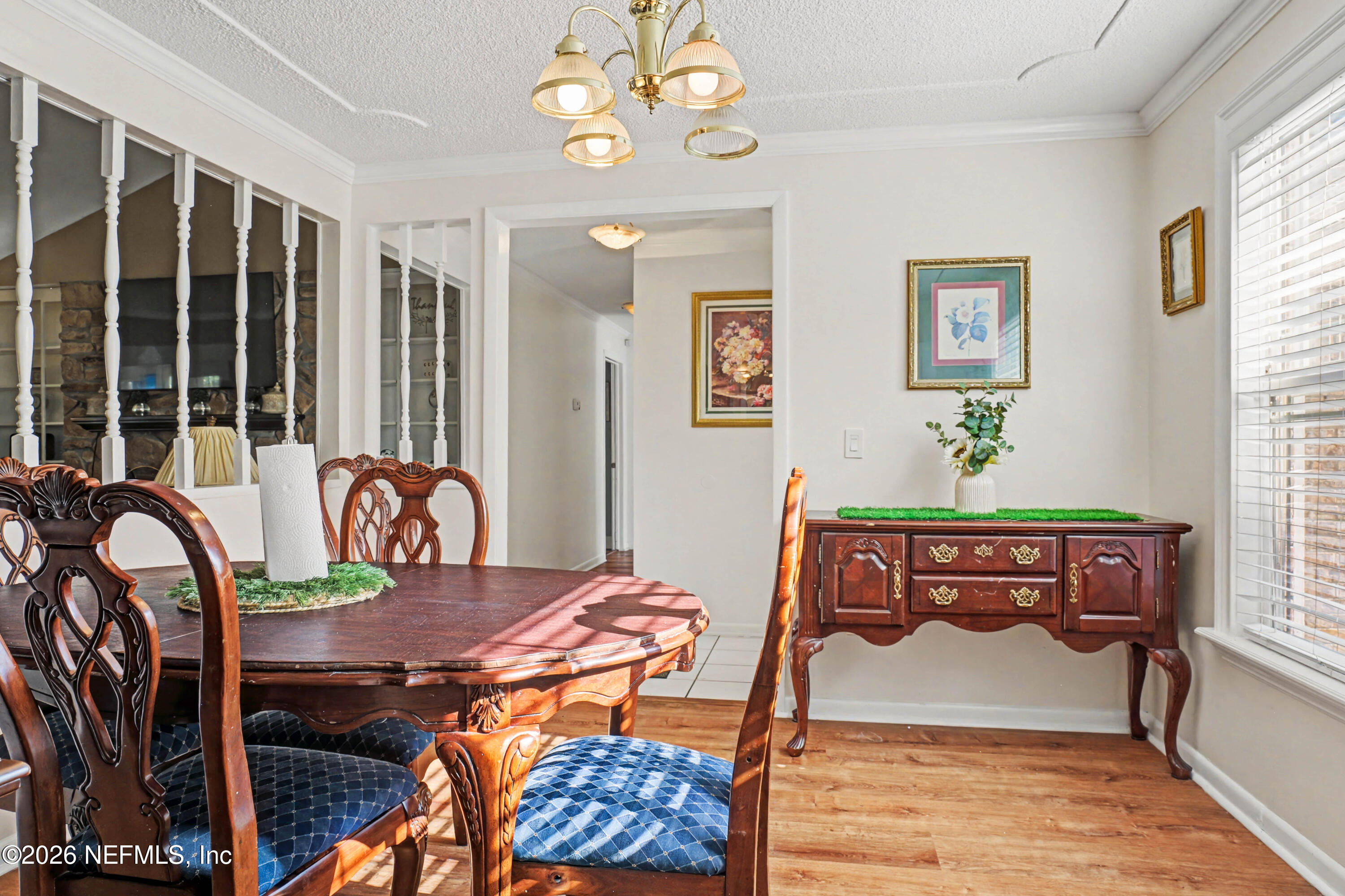 1502 Pointer Drive West Jacksonville, FL 32221 - Photo 11 of 33 a bedroom with a bed dresser and a window