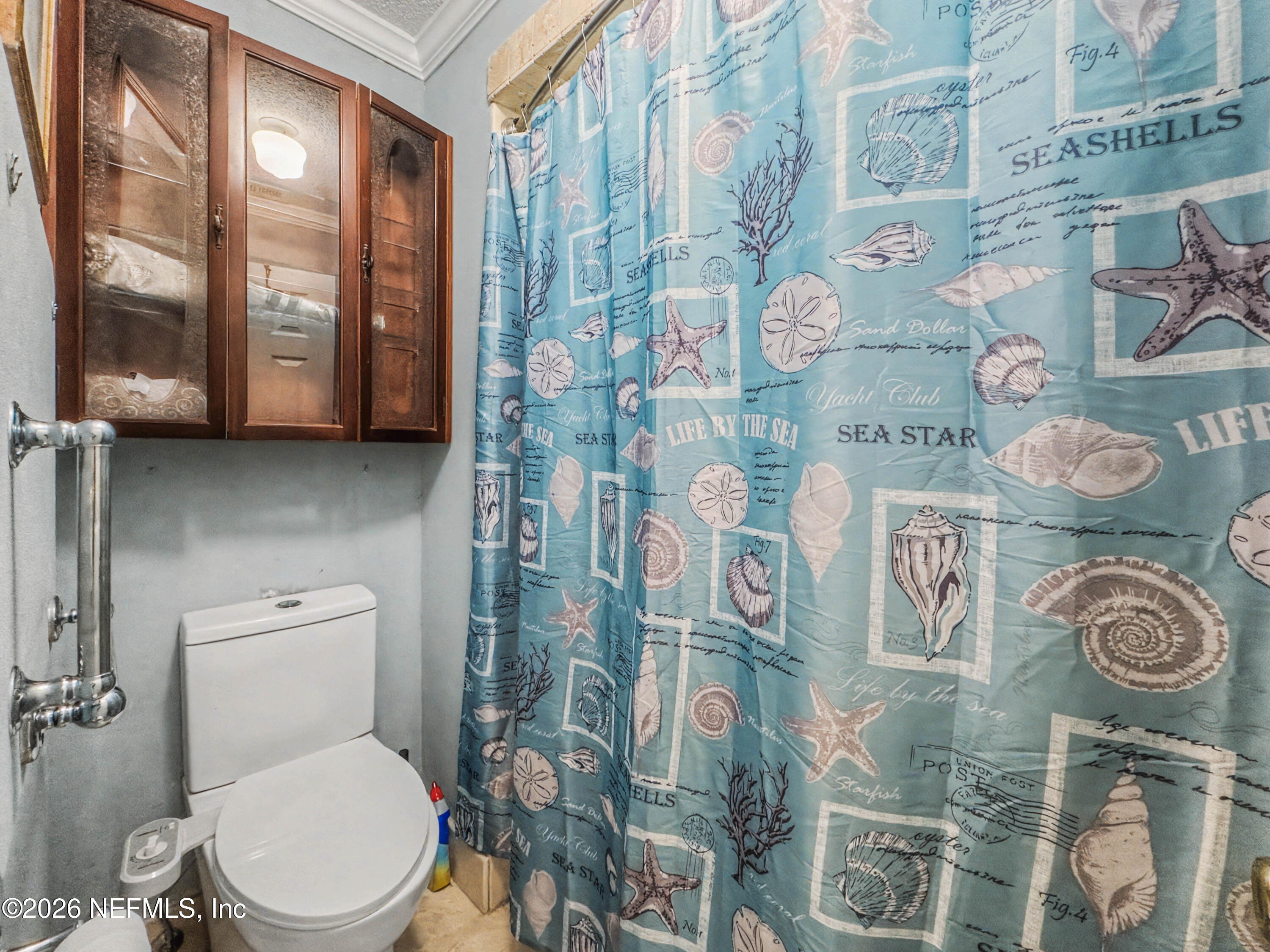 1502 Pointer Drive West Jacksonville, FL 32221 - Photo 16 of 33 a white toilet sitting next to a bathroom sink