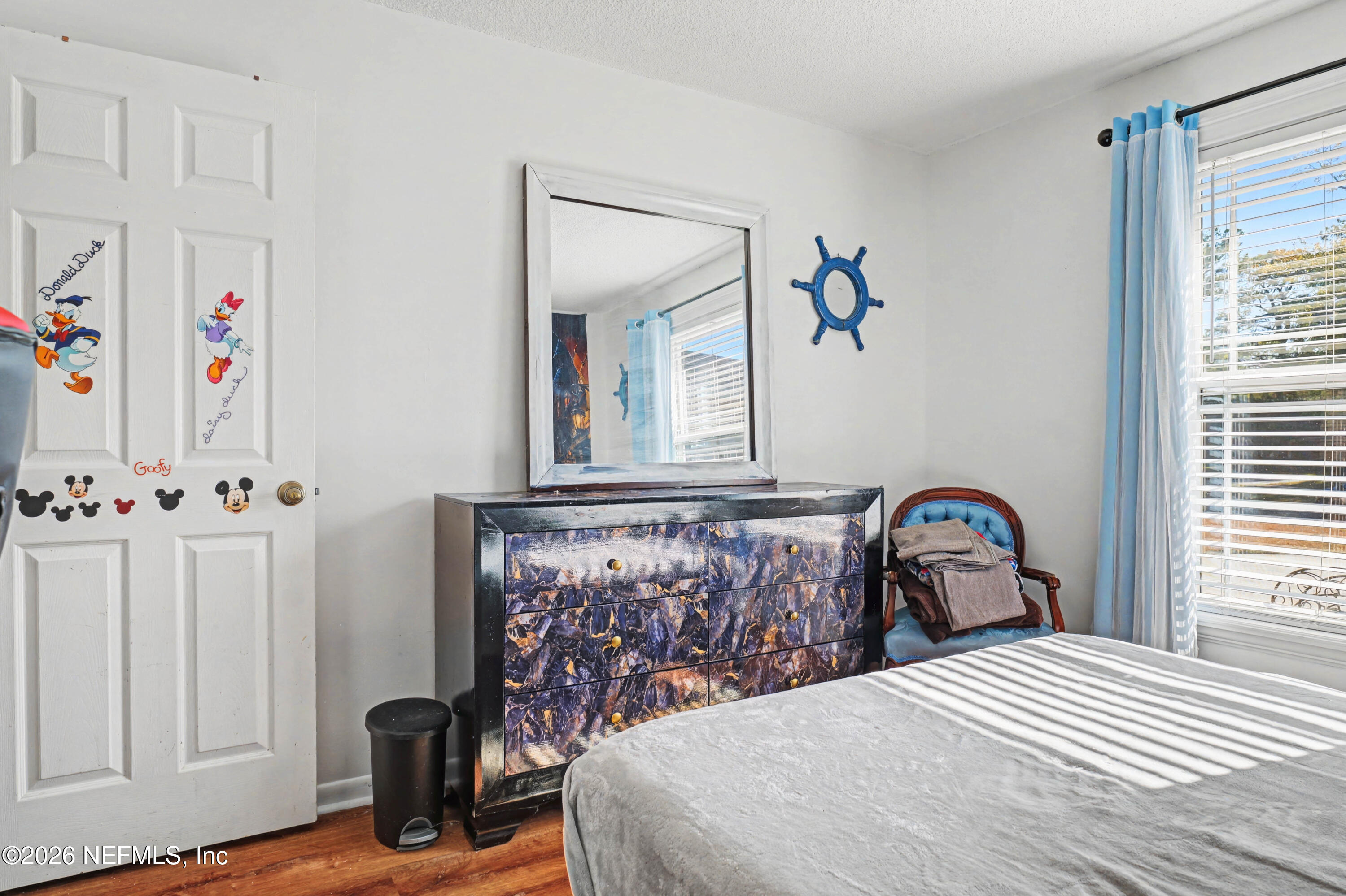 1502 Pointer Drive West Jacksonville, FL 32221 - Photo 17 of 33 a bedroom with a bed and a window