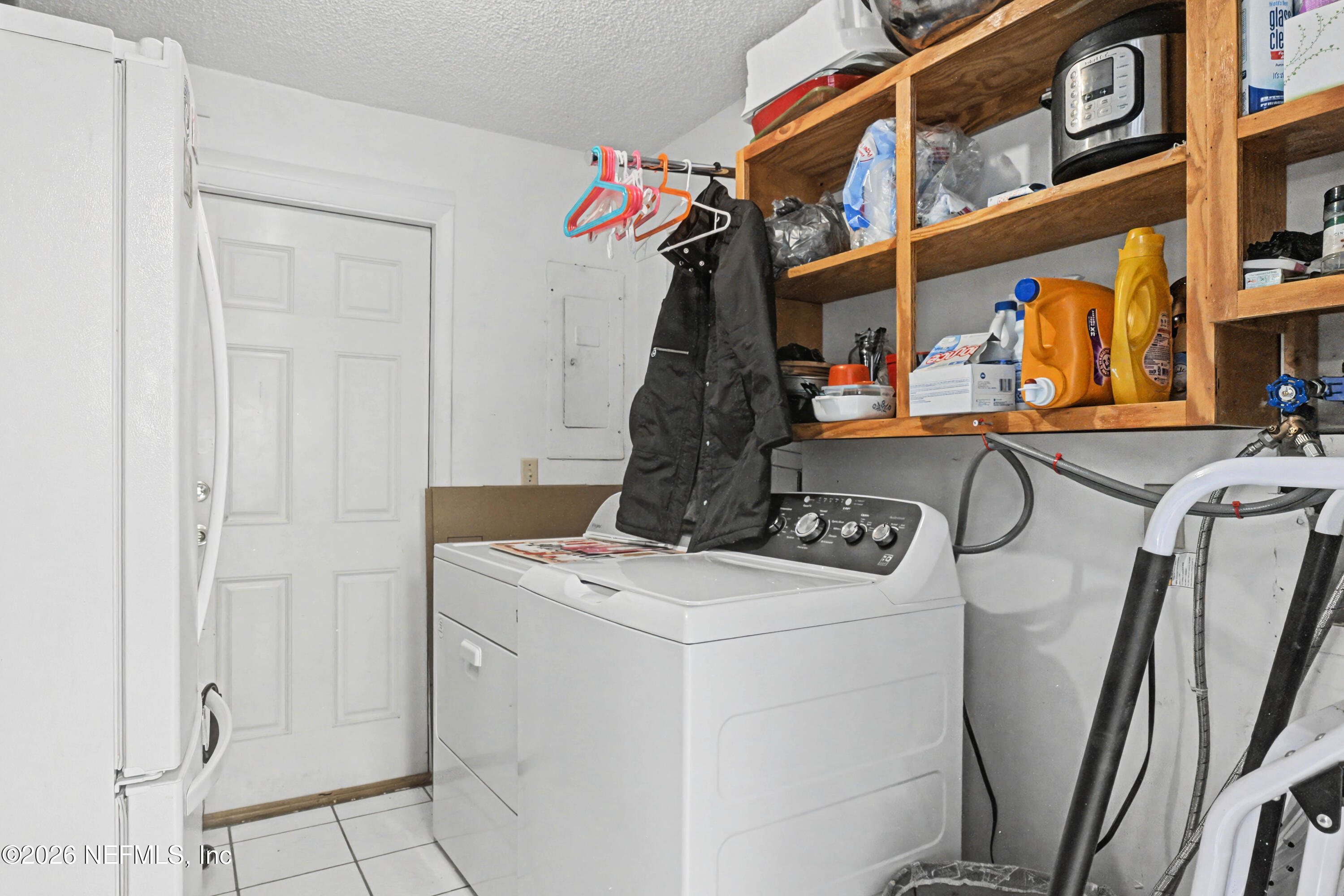 1502 Pointer Drive West Jacksonville, FL 32221 - Photo 30 of 33 a utility room with dryer and washer