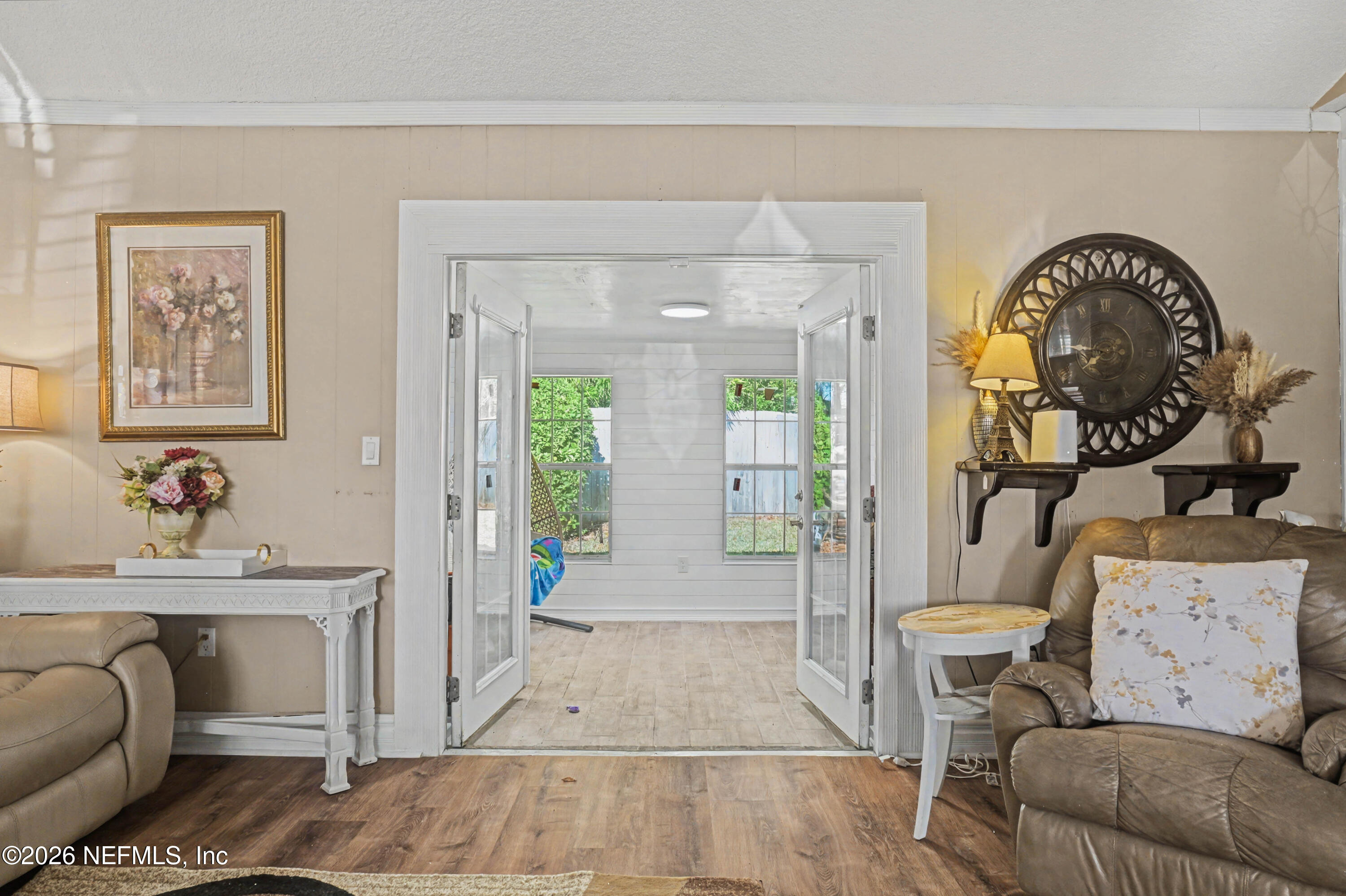 1502 Pointer Drive West Jacksonville, FL 32221 - Photo 31 of 33 a living room with furniture and a wooden floor