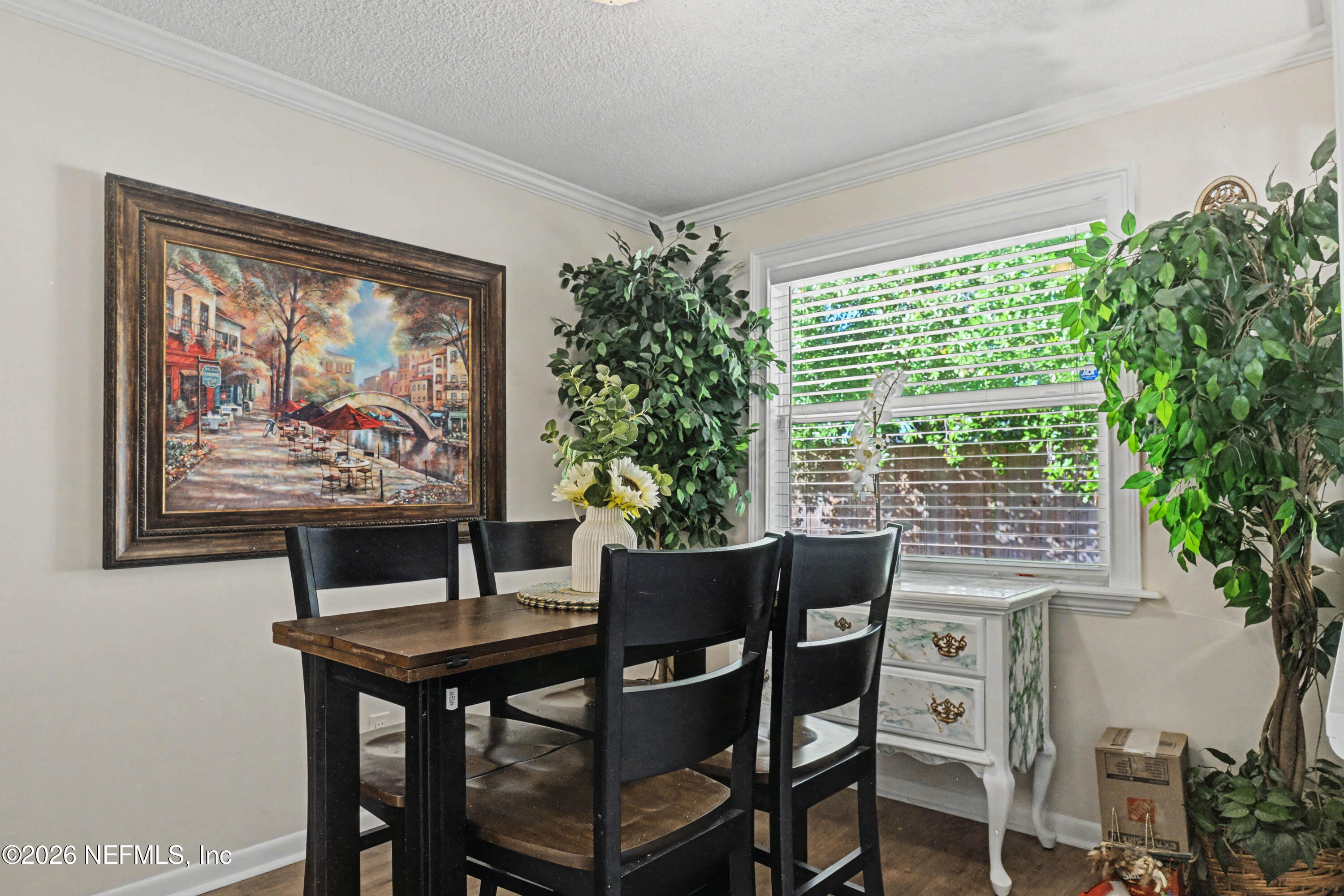 1502 Pointer Drive West Jacksonville, FL 32221 - Photo 6 of 33 a view of a dining room with furniture window and outside view