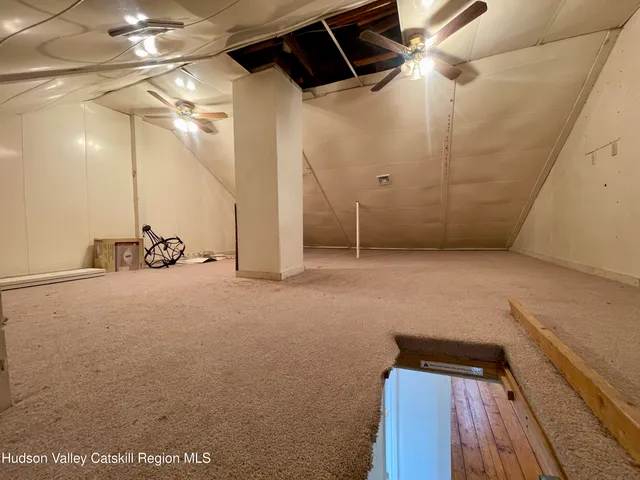 a view of a back yard from a balcony