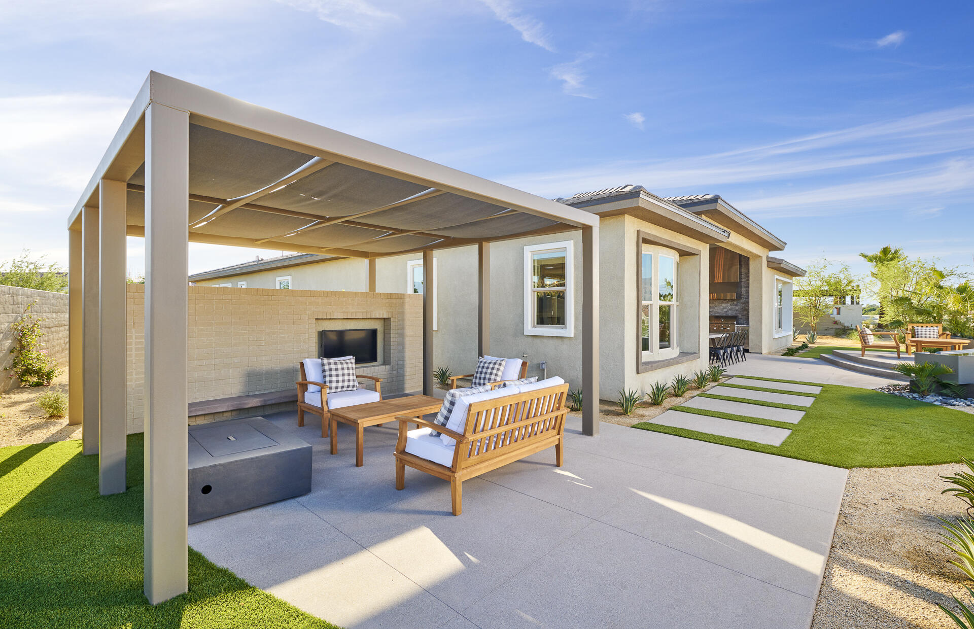 21 Chablis Rancho Mirage, CA 92270 - Photo 4 of 17 a living room with furniture and a yard