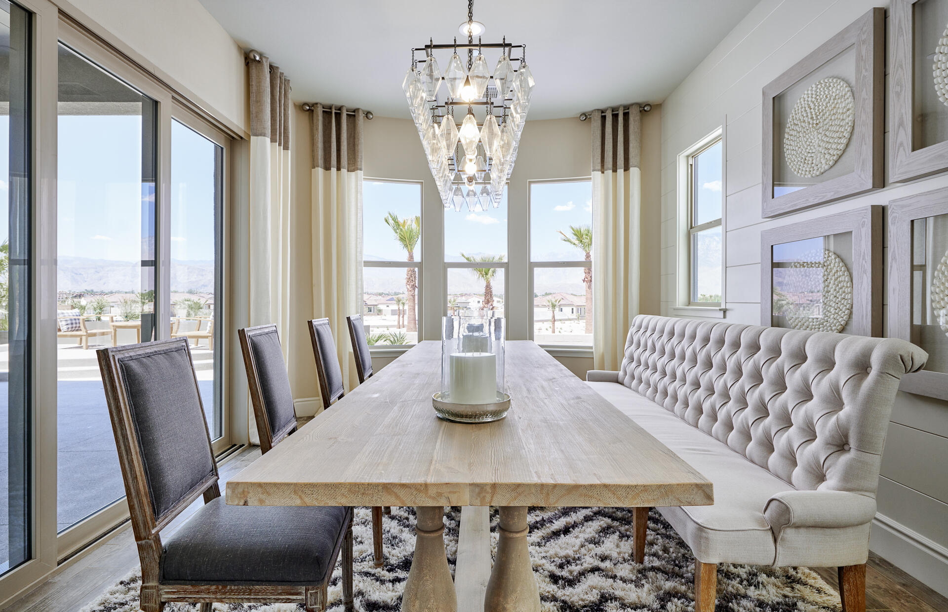 21 Chablis Rancho Mirage, CA 92270 - Photo 8 of 17 a dining room with furniture a chandelier and wooden floor
