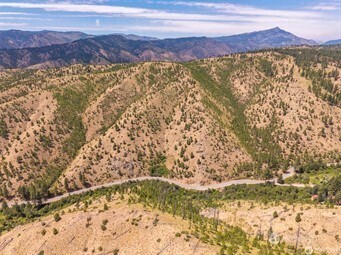 4 Mud Creek Road Entiat, WA 98822 - Photo 13 of 29 a view of a mountain from a lake