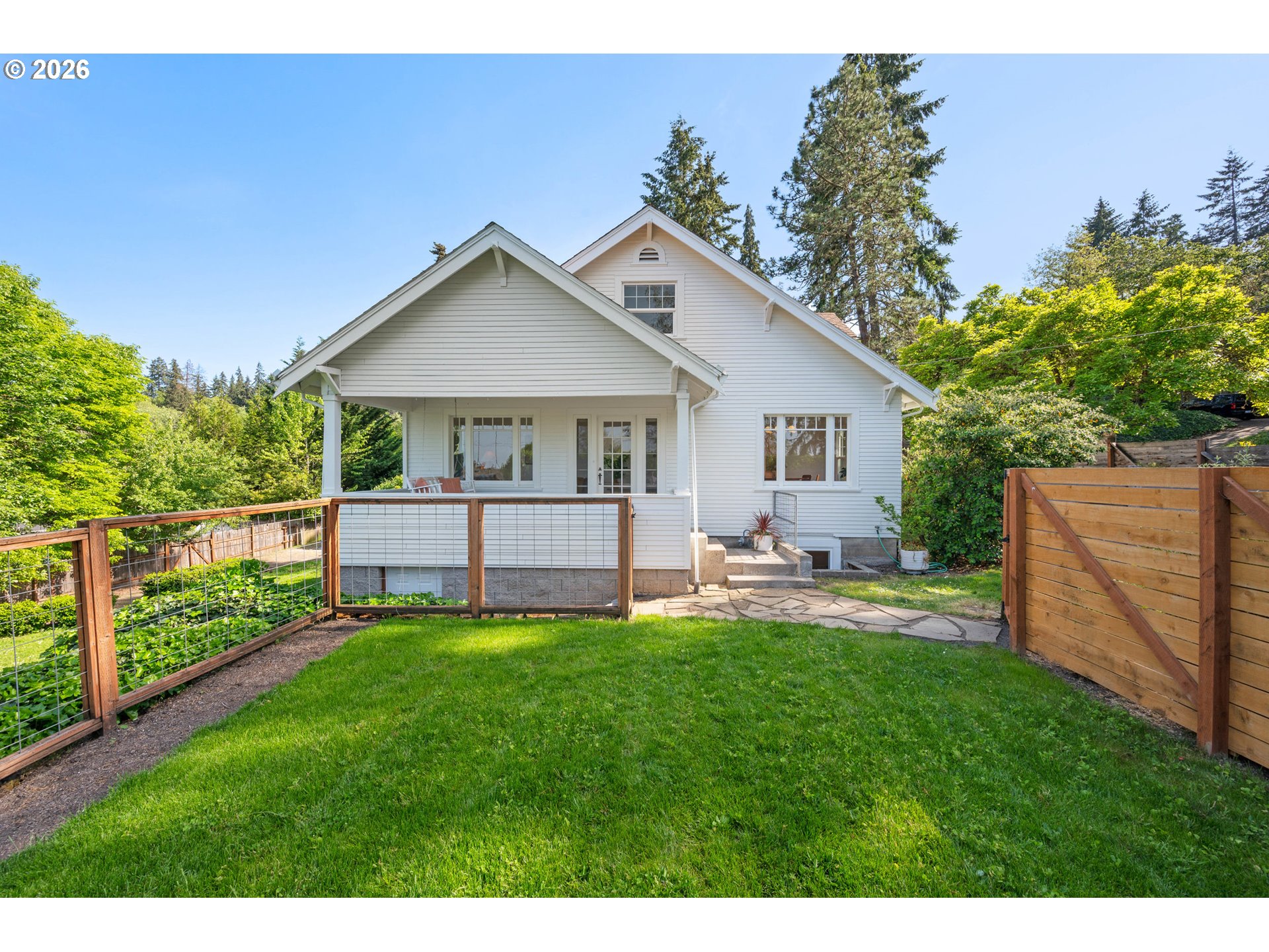 2219 City View Street Eugene, OR 97405 - Photo 1 of 48 a view of a house with a yard and sitting area