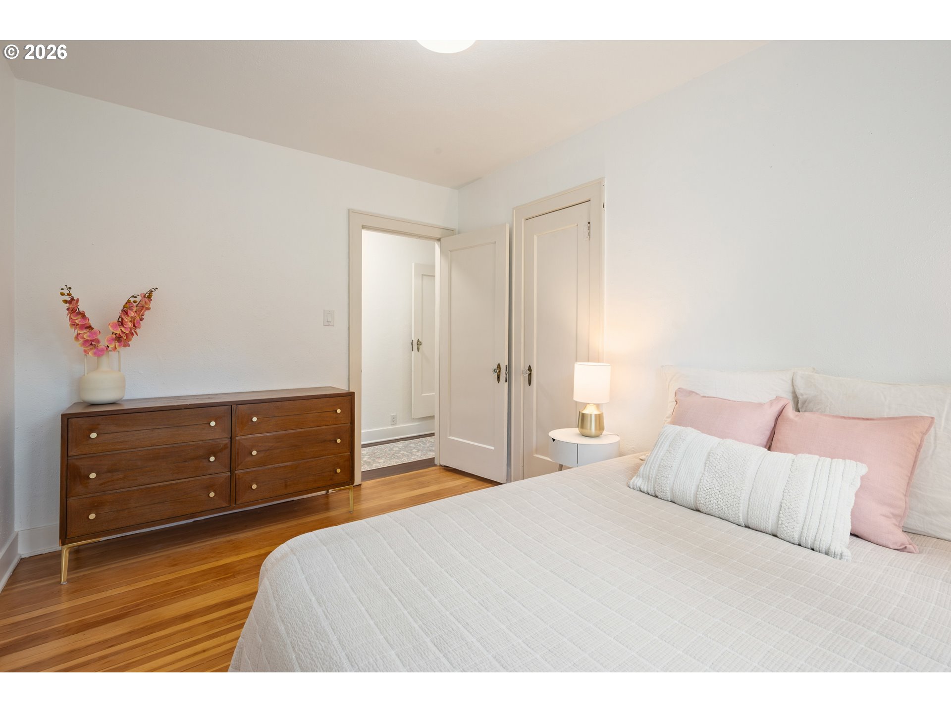2219 City View Street Eugene, OR 97405 - Photo 15 of 48 a bedroom with a bed and a dresser