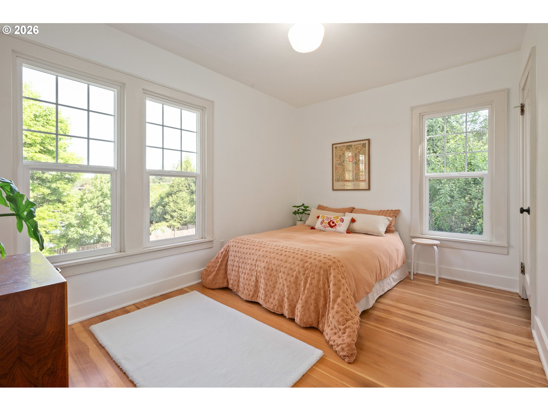 2219 City View Street Eugene, OR 97405 - Photo 16 of 48 a bedroom with a bed and a large window