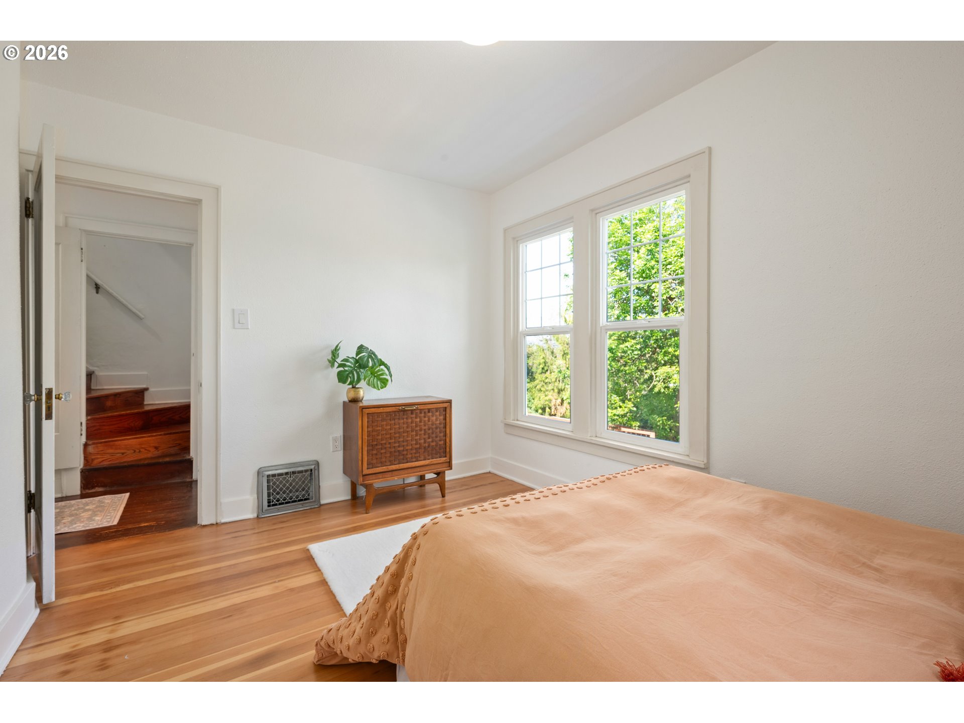 2219 City View Street Eugene, OR 97405 - Photo 17 of 48 a bed room with a bed and a television