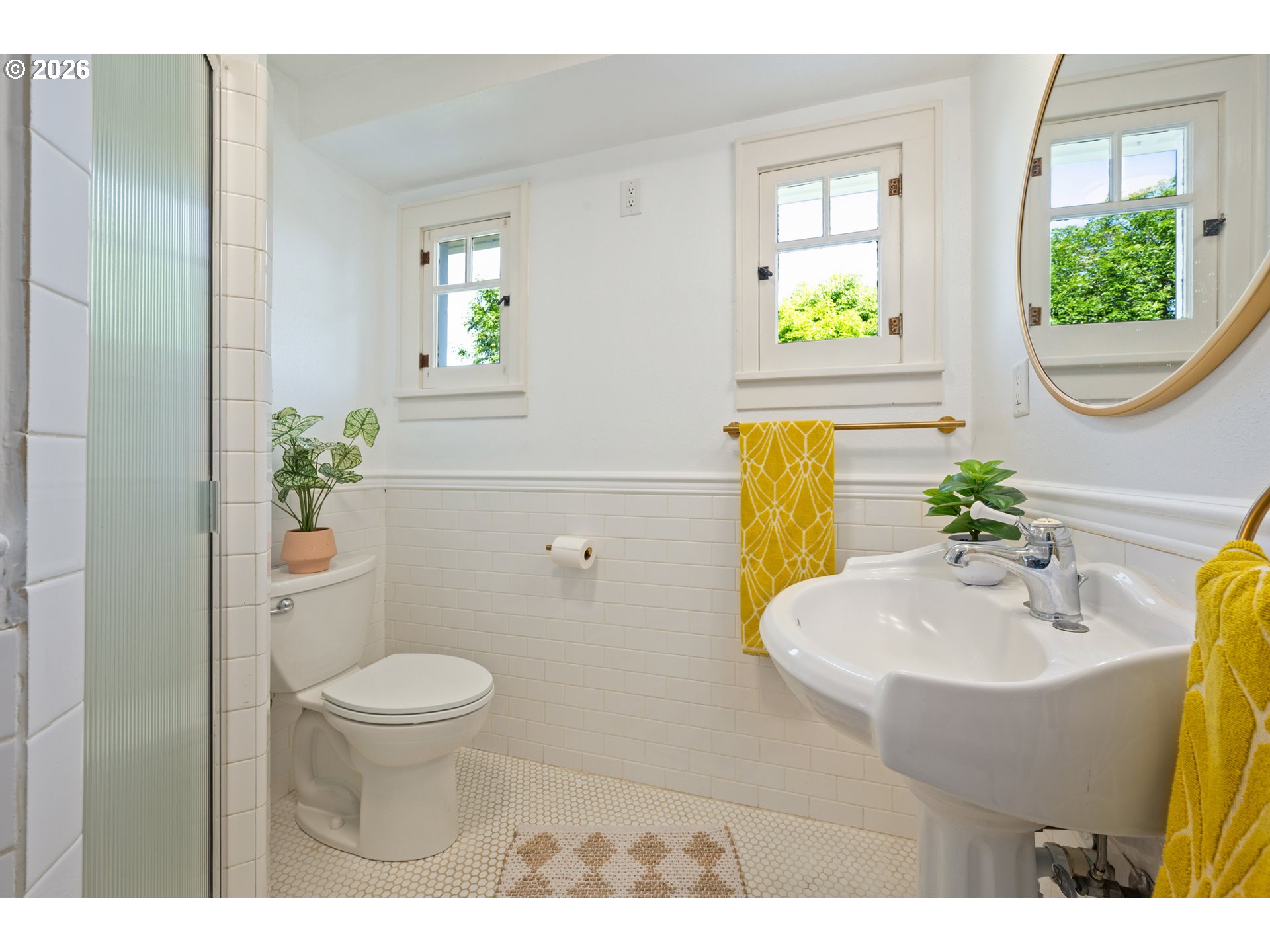 2219 City View Street Eugene, OR 97405 - Photo 18 of 48 a bathroom with a sink and a mirror