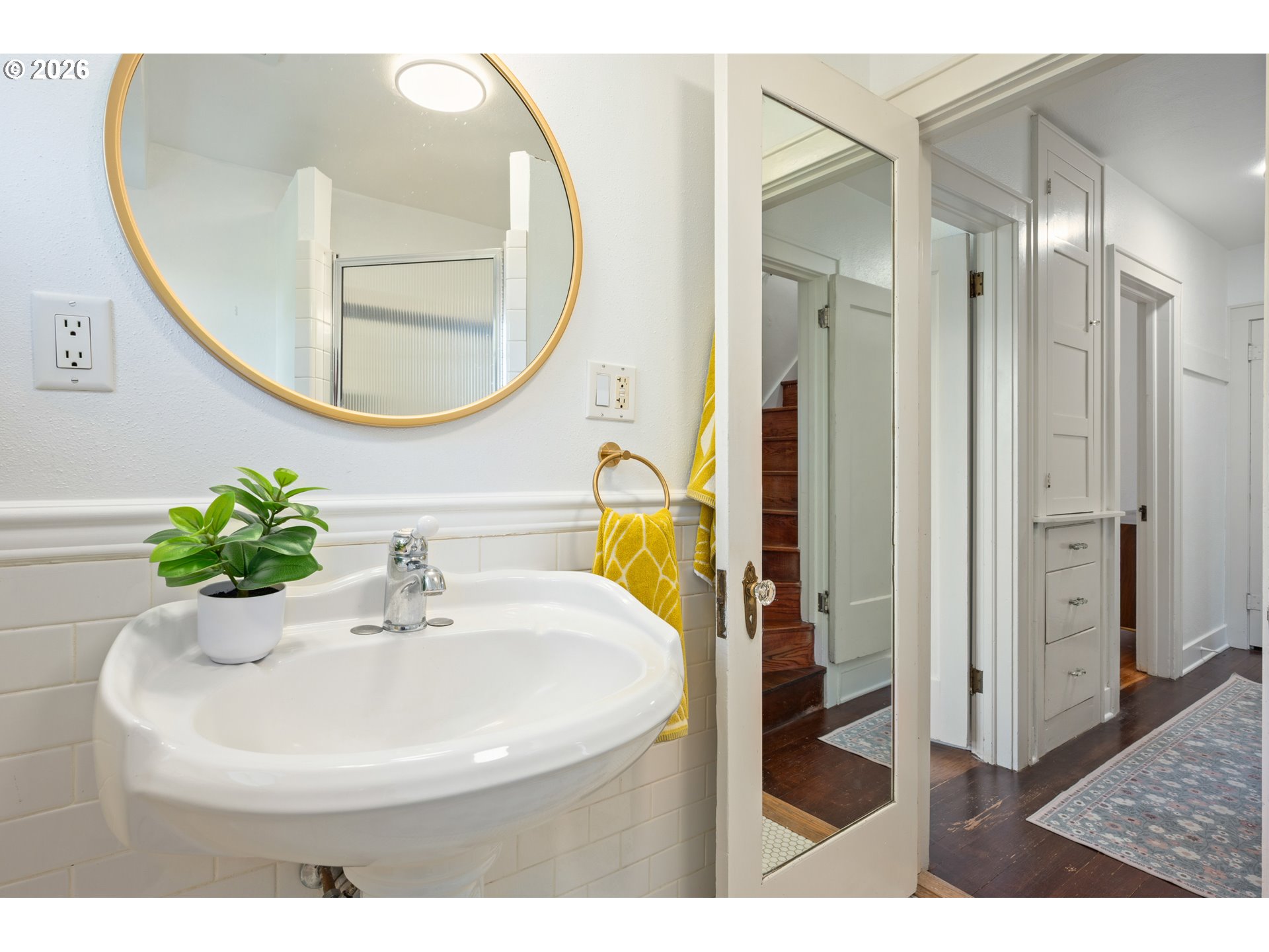 2219 City View Street Eugene, OR 97405 - Photo 19 of 48 a bathroom with a sink and a mirror