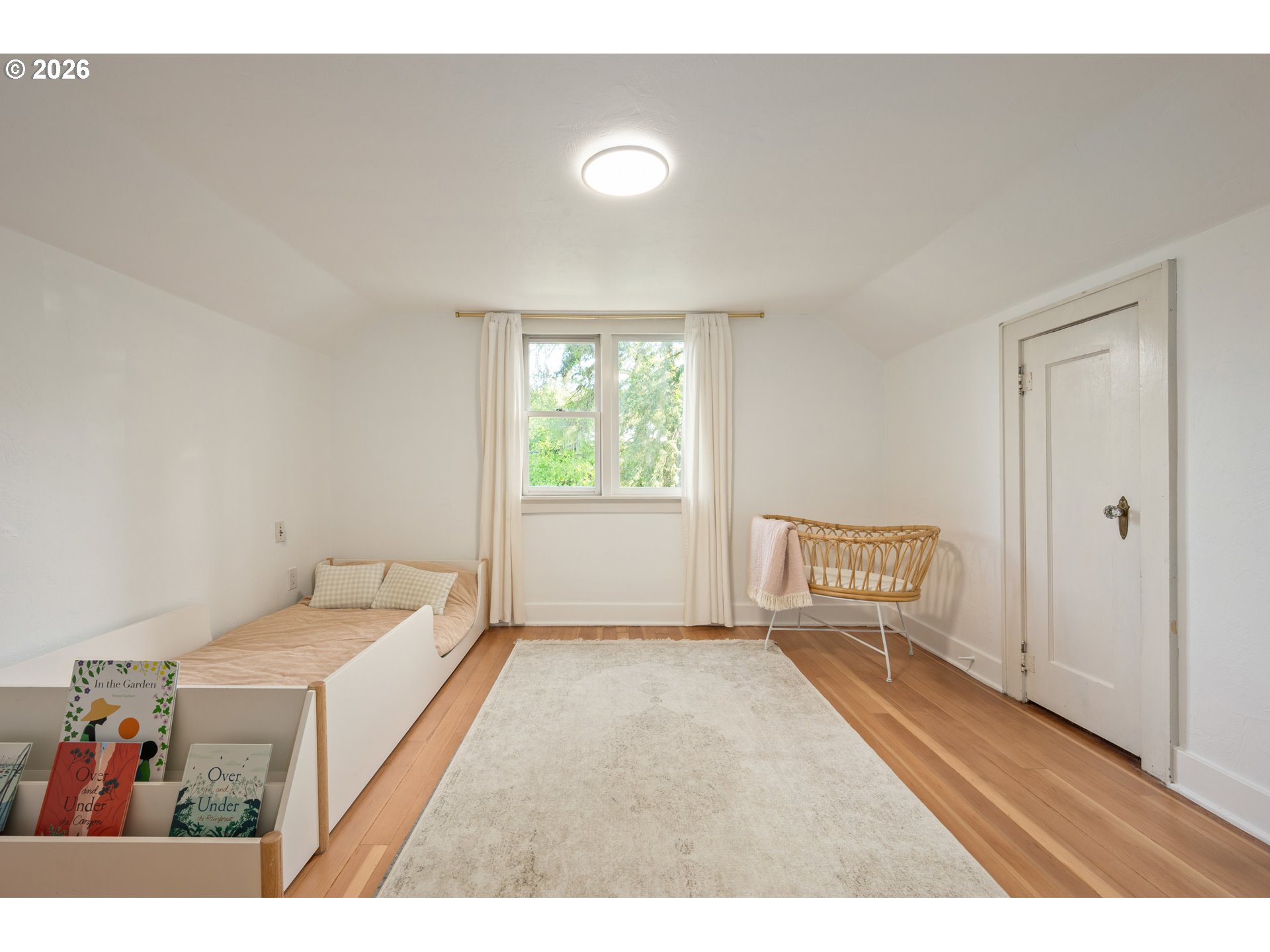 2219 City View Street Eugene, OR 97405 - Photo 23 of 48 a bedroom with a bed and a window