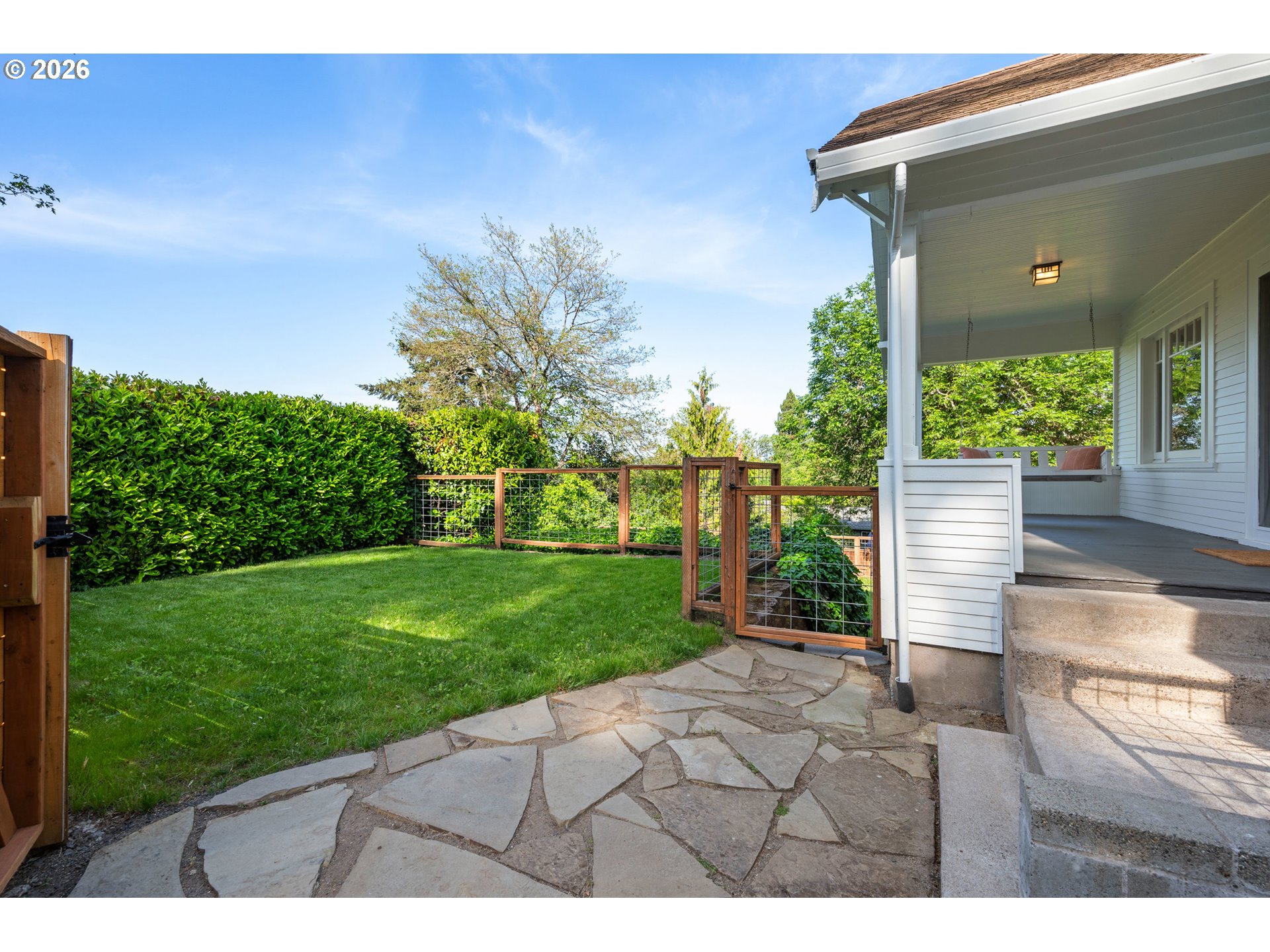 2219 City View Street Eugene, OR 97405 - Photo 3 of 48 a view of a backyard with garden