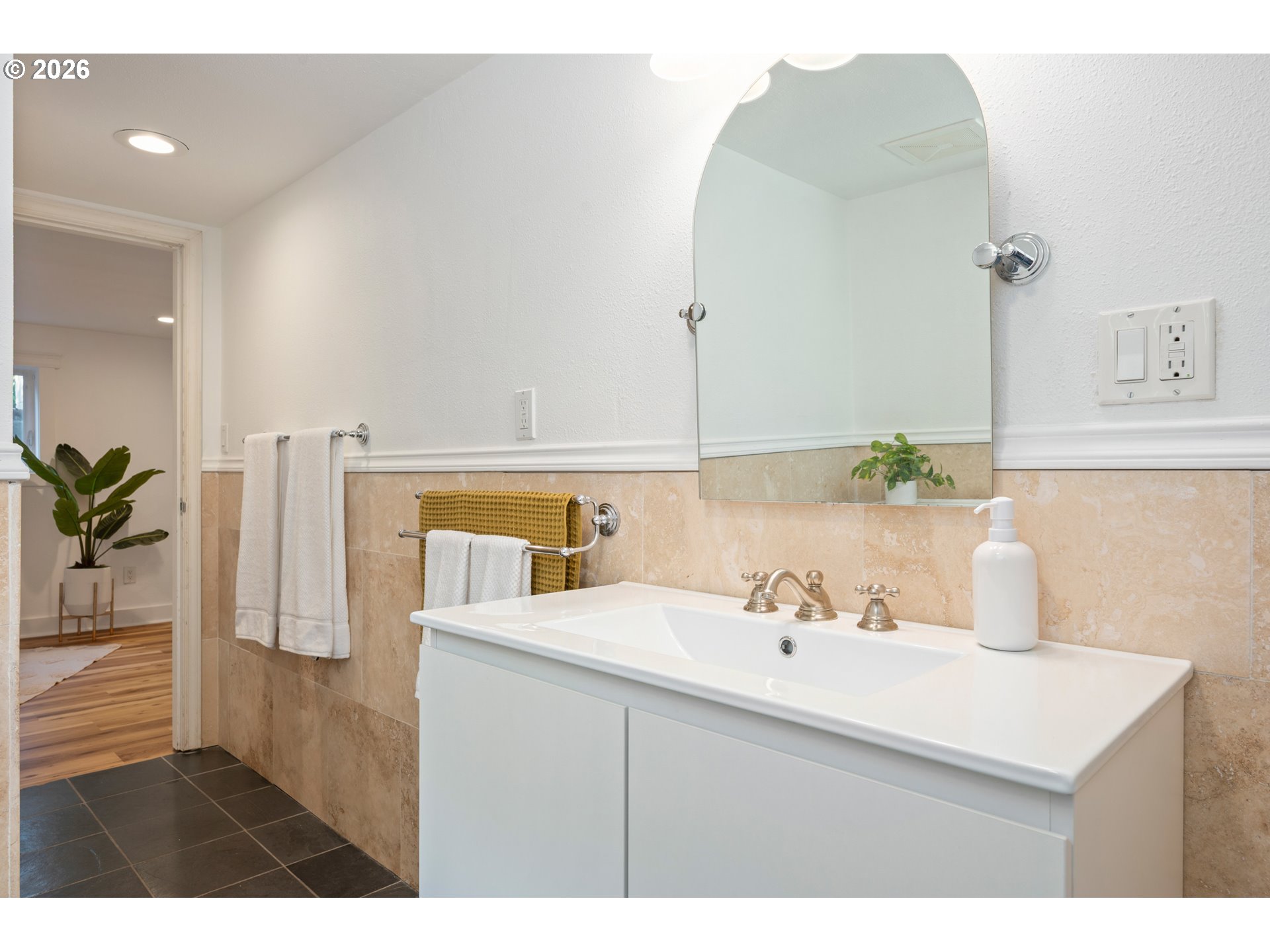 2219 City View Street Eugene, OR 97405 - Photo 31 of 48 a bathroom with a sink and a mirror