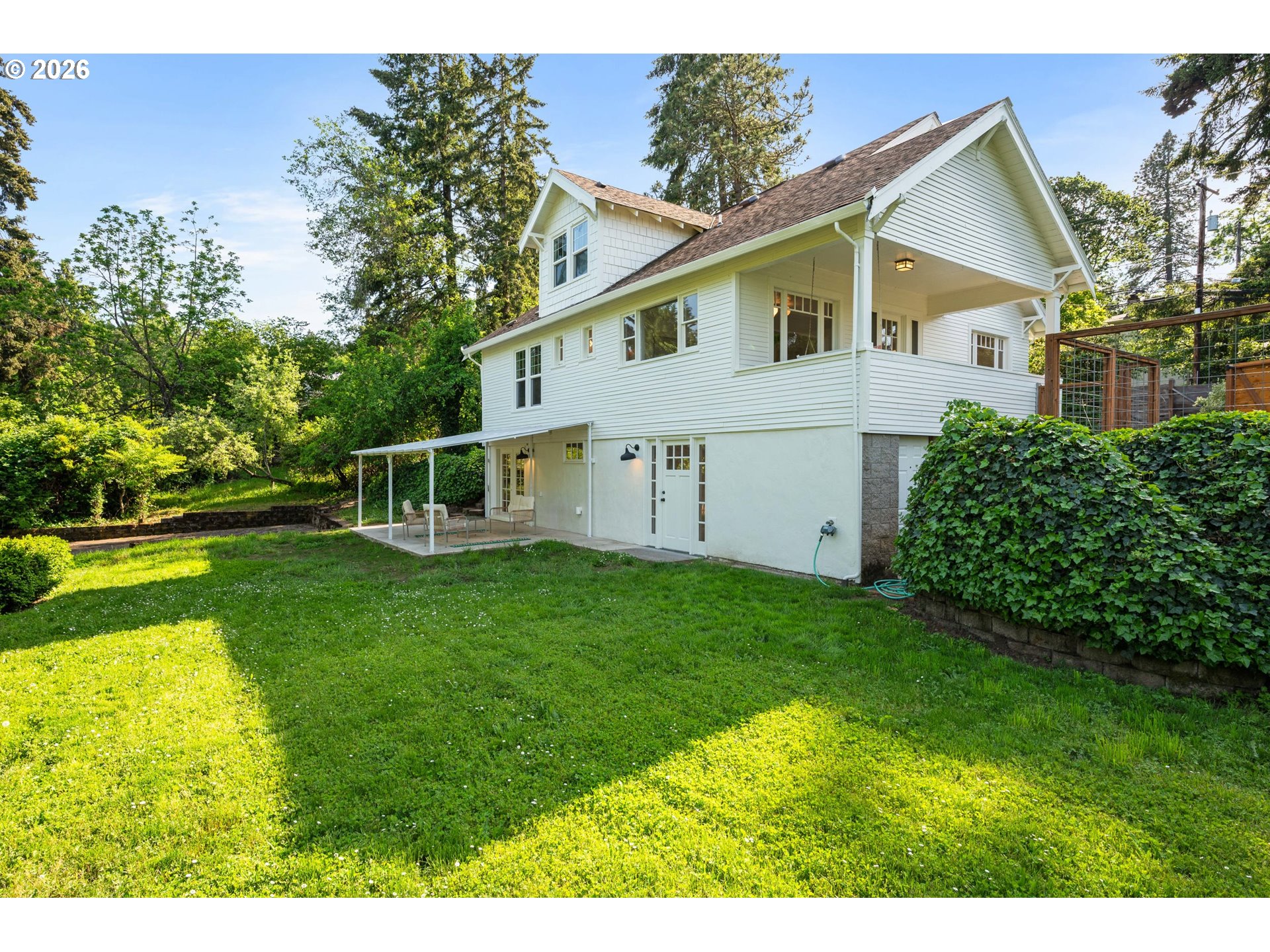 2219 City View Street Eugene, OR 97405 - Photo 41 of 48 a view of a house with backyard and garden