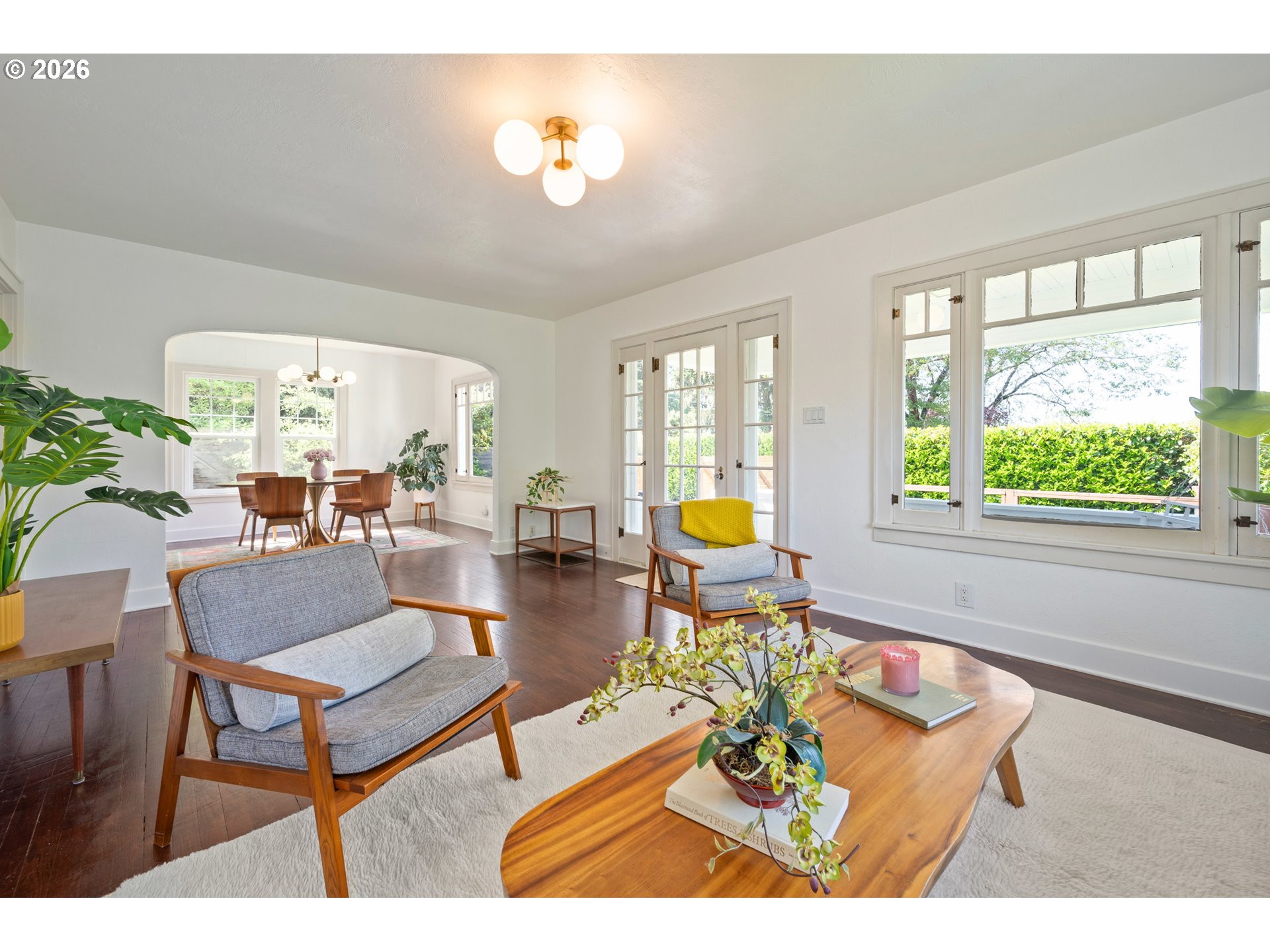 2219 City View Street Eugene, OR 97405 - Photo 6 of 48 a living room with furniture and a large window
